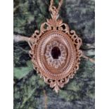 20thC 9ct Gold Almaldine garnet set Pendant with hinged back and Long link chain 9.8g total weight