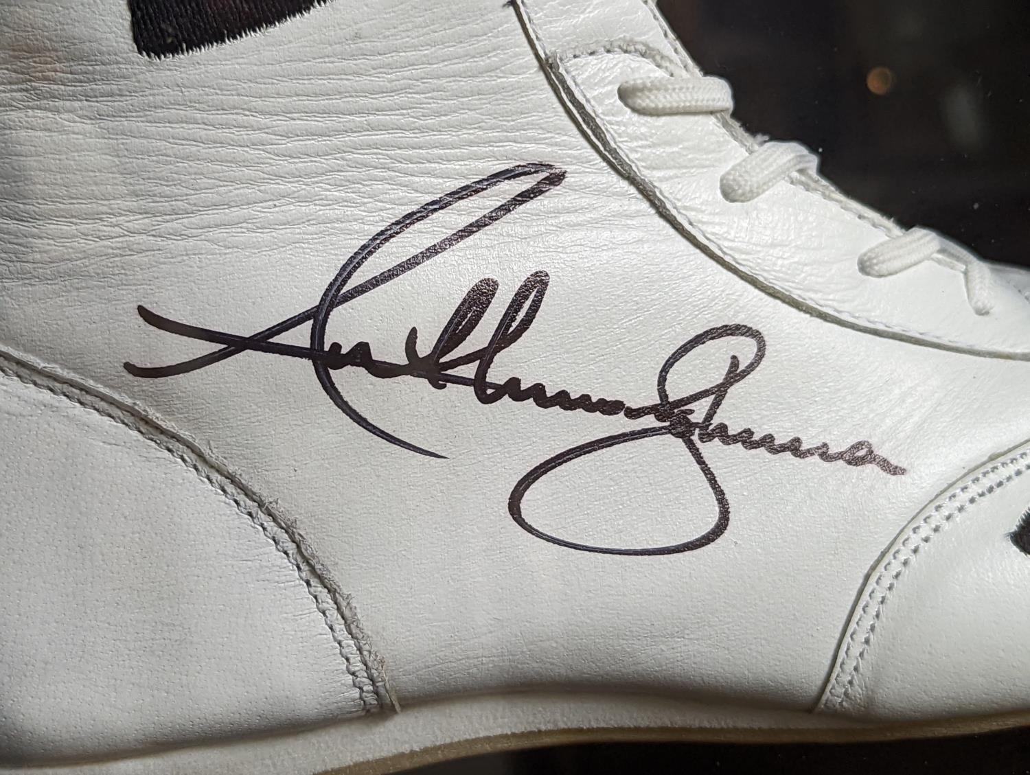 A framed and signed replica boxing boot signed by Anthony Joshua. Please note: this is a replica - Image 3 of 3