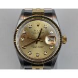 Rolex Oyster Perpetual Date Just Bimetal Chronometer with Diamond set numeral markers. 34mm case