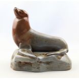 A Wedgwood Norman Wilson glazed seal, circa 1959, designed and signed by John Skeaping, stamped