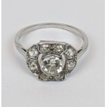 Ladies Art Deco 18ct White Gold Diamond set cluster ring. Central 0.75ct G/H Si estimated rub over