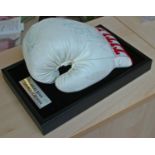 George Foreman & Nigel Benn Personally Signed Title Glove A full size Title boxing glove