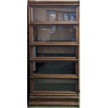 5 Stack Oak Barristers bookcase with coppered fittings, drawer to base. 182cm tall by 86cm wide by