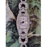 Ladies Edwardian Swiss Platinum Diamond set cocktail watch 17g total weight with movement