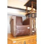 Leatherette small elbow chair with studded detail