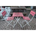 Metal slatted table and chairs