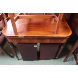 19thC Mahogany and Walnut fold over Tea table on tapering turned legs