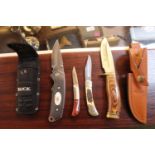 2 Boxed Buck Knives and 3 Winchester pocketknives