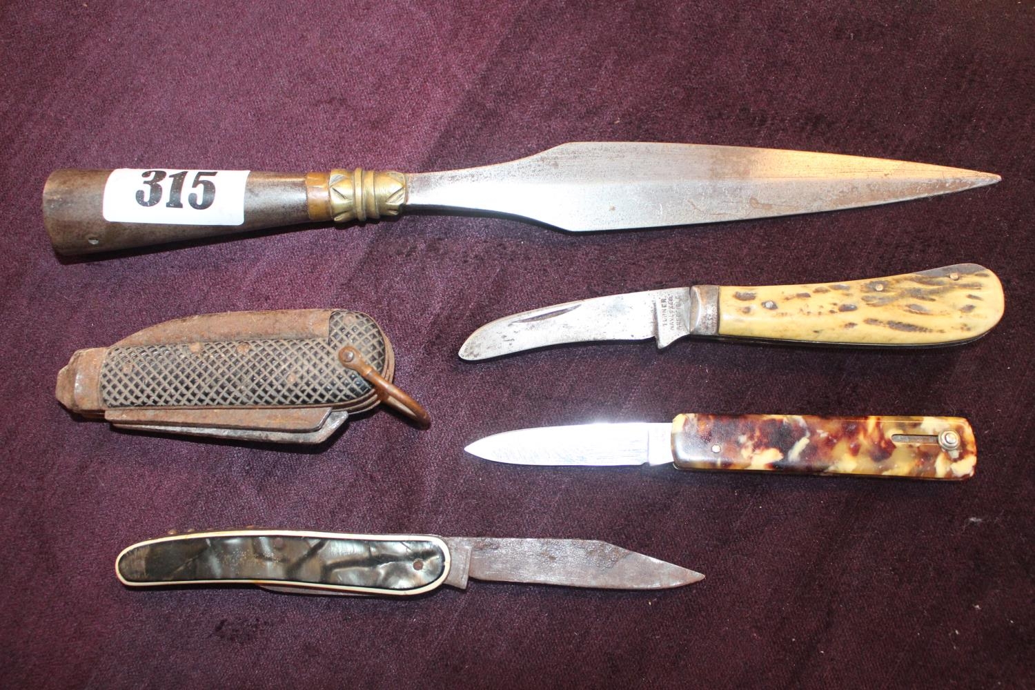 1930s German pocket knife with spring operated blade, marked DRP Solingen, tribal spear head and