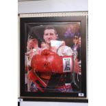 Carl Froch signed Everlast glove in bubble presentation case. 51 x 61cm total size