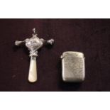 Silver Babies Mother of Pearl rattle and a Silver plated Match Vesta