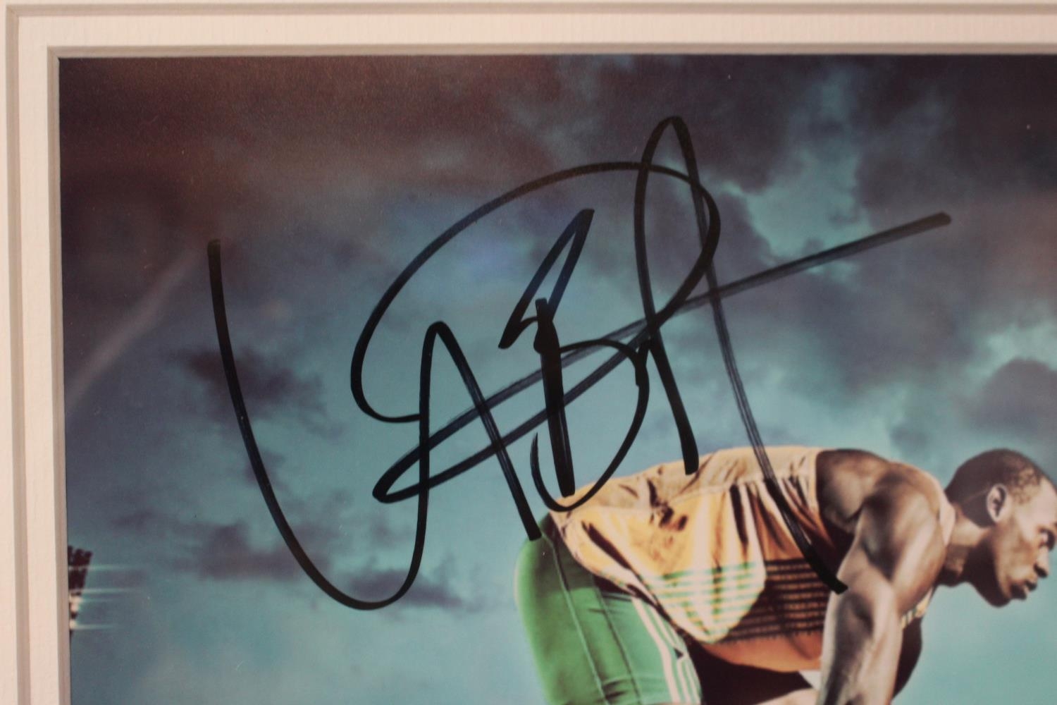 Usain Bolt Signed Photographic Print framed and mounted. 42 x 49cm - Bild 2 aus 2