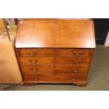 Georgian Oak Bureau with fitted interior on bracket feet with brass drop handles