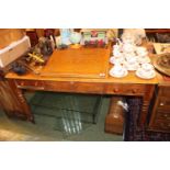 Large Oak sloped desk with fitted interior and and two drawers above turned legs