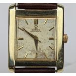 Swiss made Omega dress watch with Art Deco stylings, in square tank form, rolled gold case. on