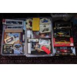 2 Boxes of Burago and other boxed vehicles
