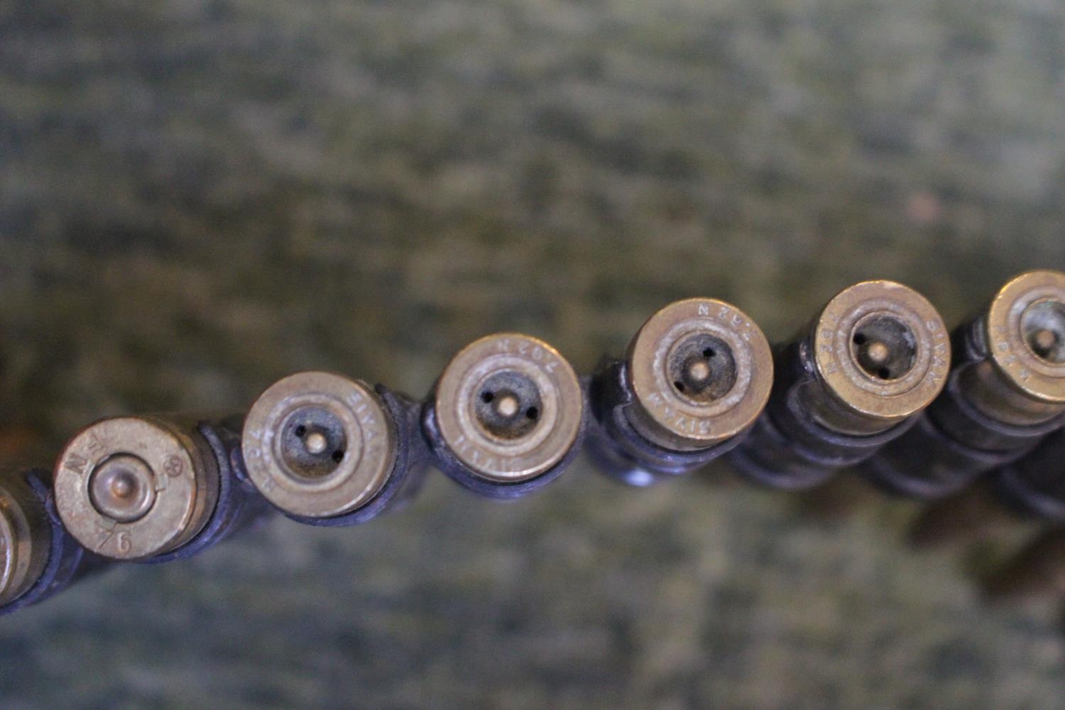 Belt of 60 machine gun bullets inert - Image 2 of 2