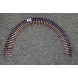 Belt of 60 machine gun bullets inert