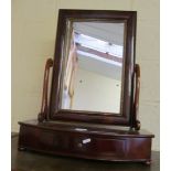 A mahogany swing toilet mirror with drawer to base
