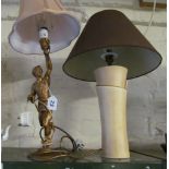 A spelter lamp in the form of a turbaned man and a modern table lamp