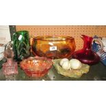 A heavy amber coloured glass bowl, other coloured glass, onyx ashtray and three eggs