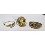 A 9ct gold ring set citrine 3.3g, a 9ct ring set ruby and seed pearls (cut) 1.7g and a small