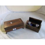 A 19th Century rosewood box with sliding lid and claw feet and a travelling case with two glass