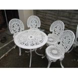 A garden table and four chairs