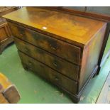 An 18th walnut veneered chest of three graduated drawers on bracket feet