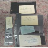 Three autographs; Shirley Temple, Micky Rooney and another
