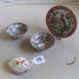 An oriental pink floral dish, two small bowls and a small lidded box