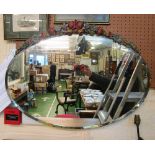 An oval barbola mirror