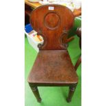 A 19th Century hall chair with arched back and a rush seat chair