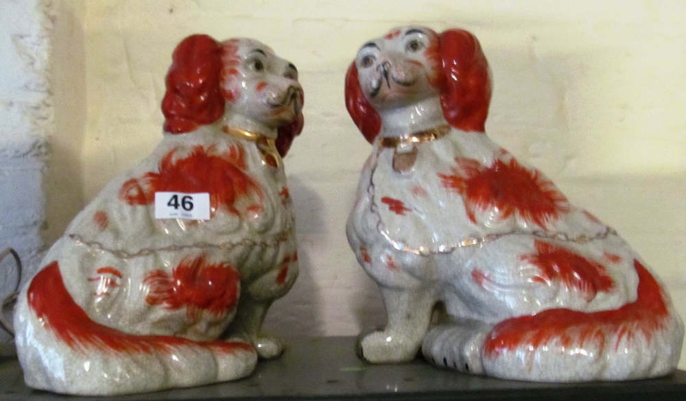 A pair large reproduction Staffordshire style dogs