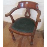 An Edwardian office style chair