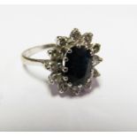 An 18ct sapphire and diamond ring size M 3.6g
