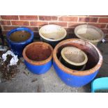 Some coloured garden pots