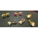 Four pairs of gold earrings set various stones