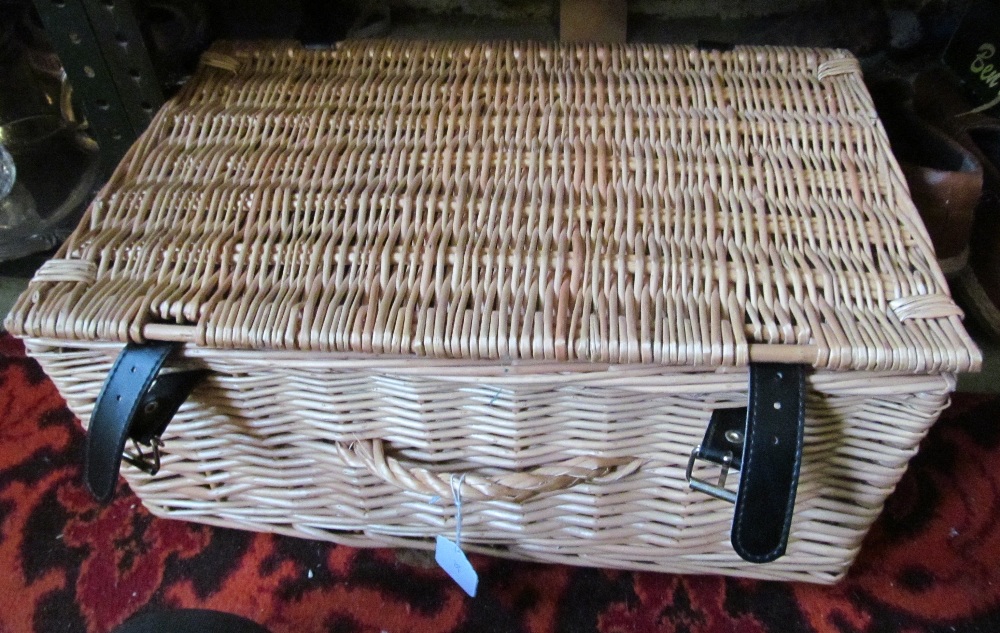 A wicker picnic basket