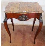 A Louis XV style marble top table on cabriole legs, gilt mounts