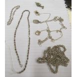 A silver coloured twist chain necklace marked 925 and other silver coloured jewellery