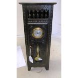 An oak cabinet with clock