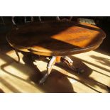 A walnut loo table