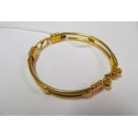 A yellow metal bracelet marked 22k 19.2g