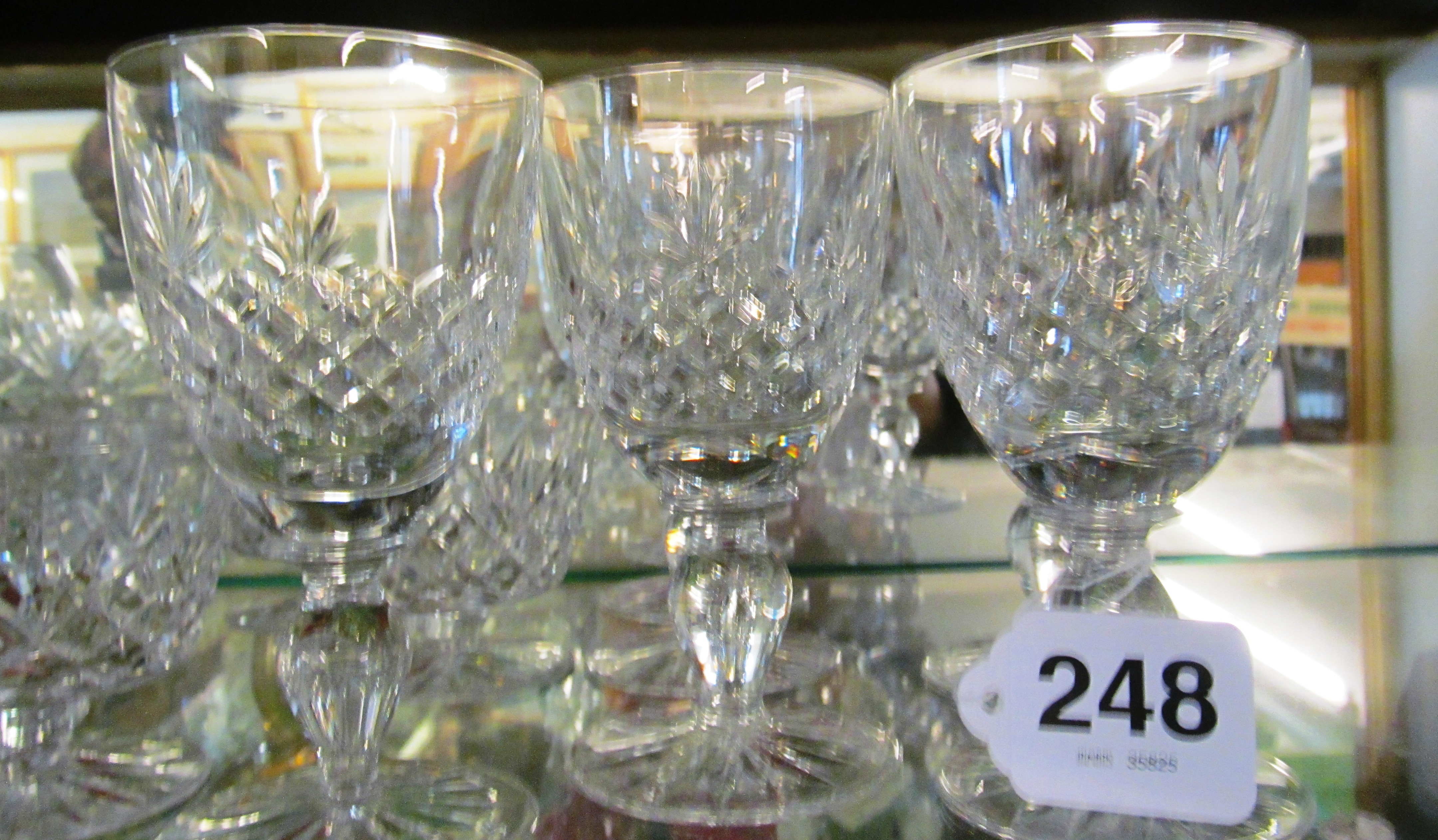 Six Royal Doulton crystal tumblers, six cut glass wine glasses and other drinking glasses
