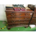A 19th Century mahogany chest with slide and four drawers on bracket feet