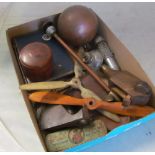 A small group of tools, small propellers, cigarette cards etc