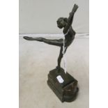 A bronze figure dancing lady