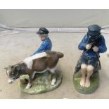 A Royal Copenhagen figure boy carving stick and another boy pulling a cow (chip hat)