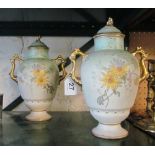A pair of Edwardian lidded vases decorated flowers (a/f)